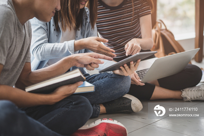 Group of students learning together in the campus.