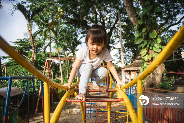 Kids climbing in the playground.