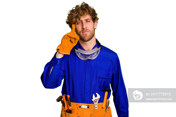 Young caucasian electrician man isolated on white background pointing temple with finger, thinking, focused on a task.