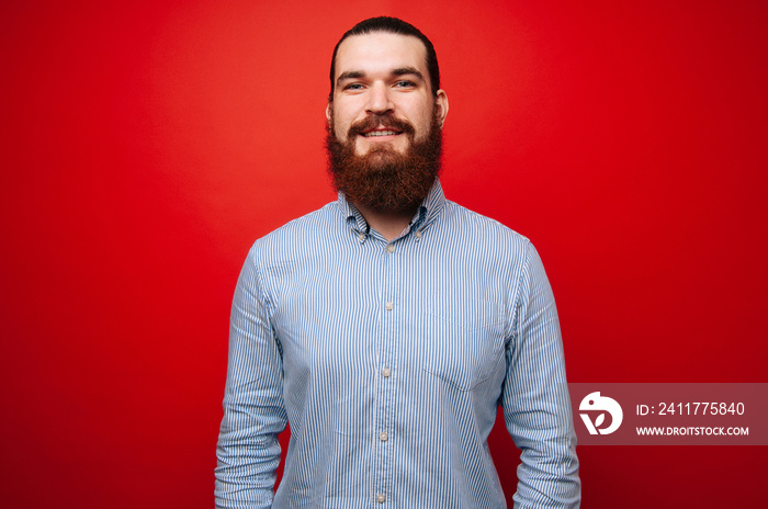 Portrait of bearded hipster man in casual looking at the camera