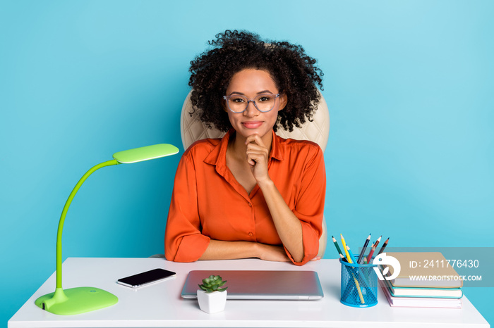 Photo of clever smart worker wear orange shirt spectacles hand arm chin listening you isolated blue color background