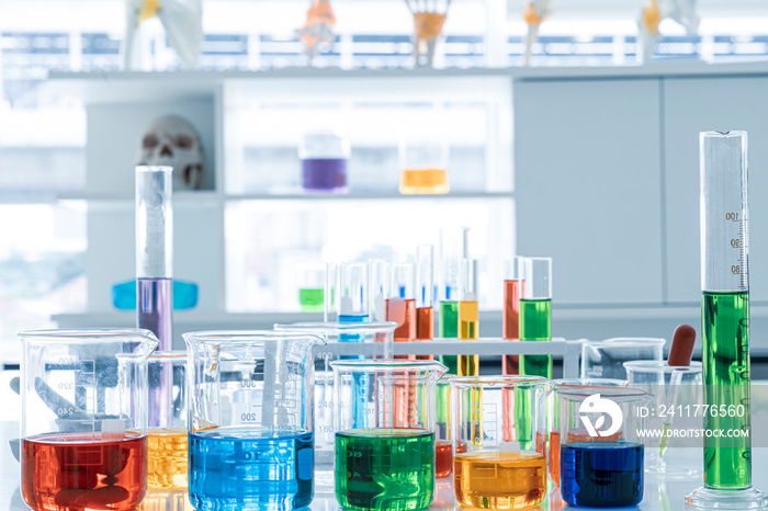 Glass beakers of various sizes in a  laboratory