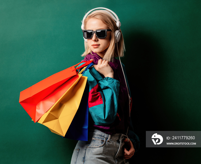 Style woman in 90s punk clothes with shopping bags