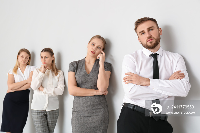 Business people waiting in line indoors