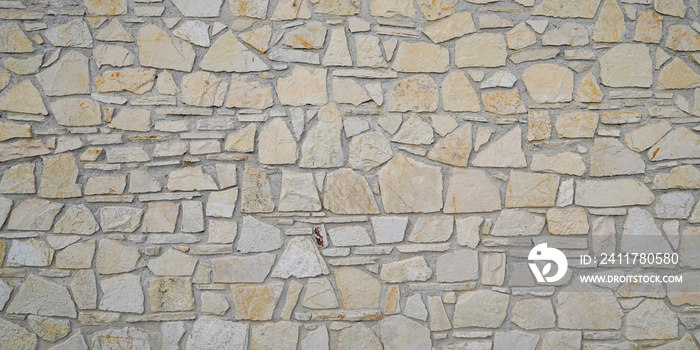 Stone wall background texture beige sand color