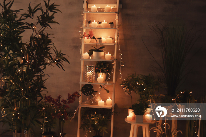 Burning candles as decor in room interior