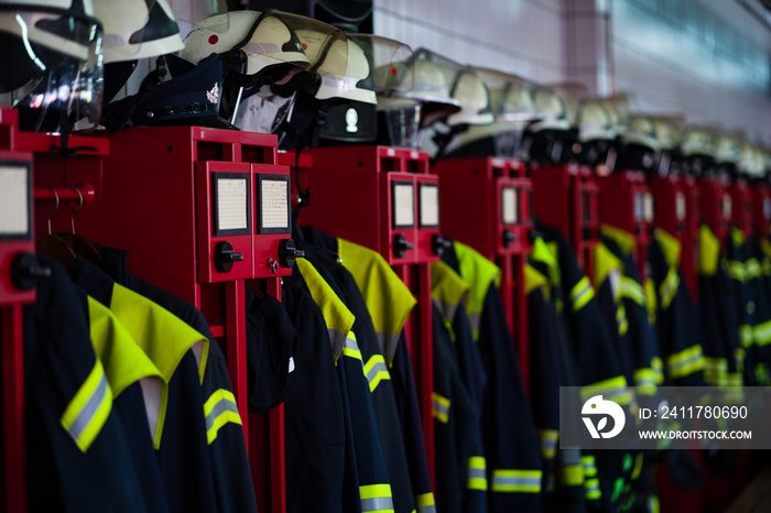 Firefighter suits and helmets at fire station