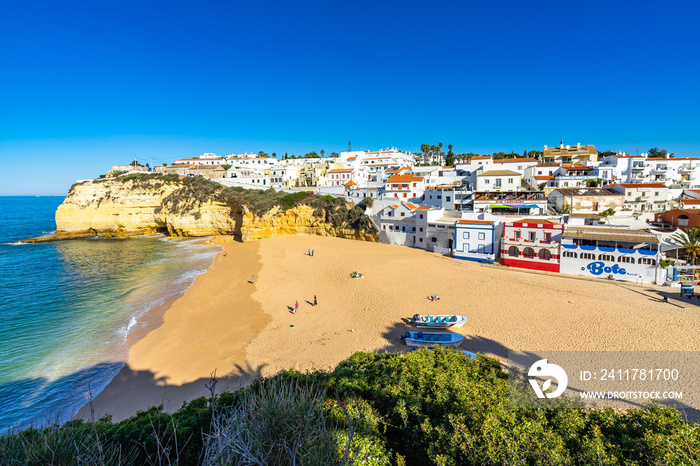 View of Carvoerio, a popular holiday destination in Algarve. From Carvoeiro departing boat tours to visit the famous Benagil cave, Portugal