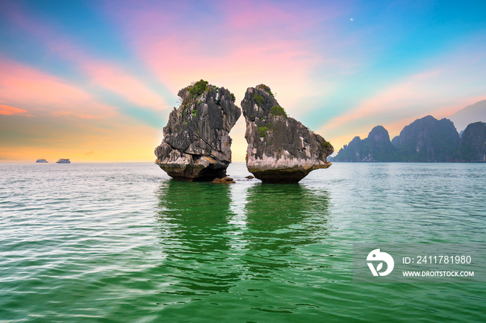 Dreamy sunset among the rocks of Halong Bay, Vietnam, This is the UNESCO World Heritage Site, it is a beautiful natural wonder in northern Vietnam