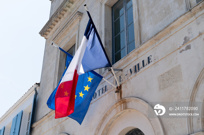 French and EU European Union flags on the city hall