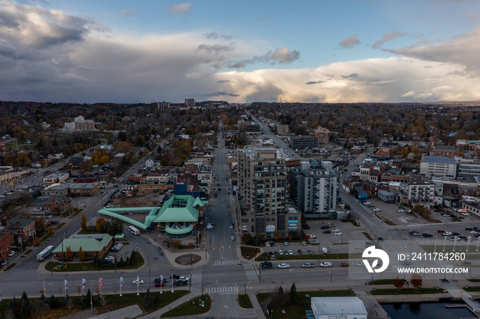 sunset fall Drone view of Barrie waterfront downtown with blue skies and clouds  centennial park and lakeshore drive  road with fall colours