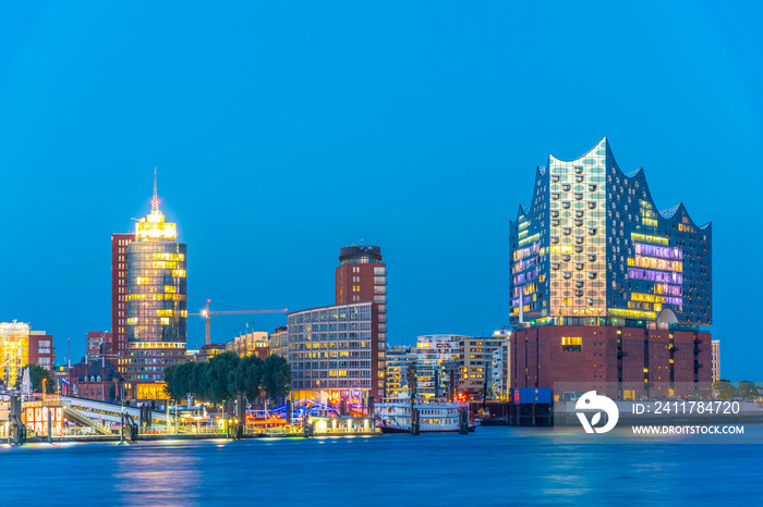 Night view of the port of hamburg with the elbphilharmonie building, Germany.