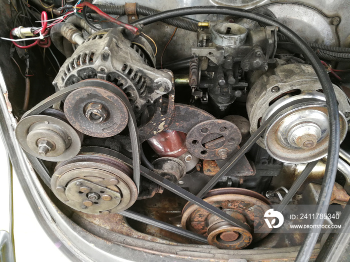 old carburetor motor car. Motor engine broken need to repair in garage