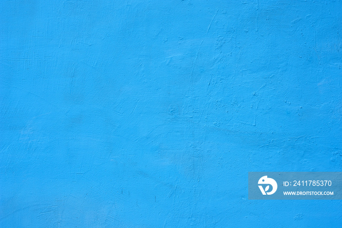 Background of a blue painted cement wall, rough cast of cement and concrete wall texture, decorative rustic coating