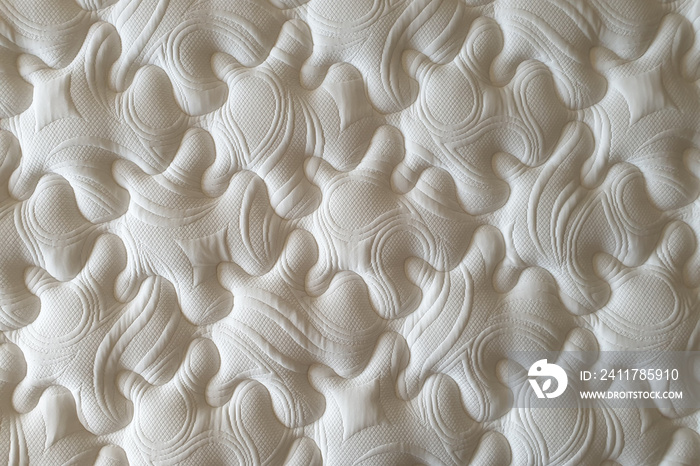 Close up brand new clean spring mattress surface