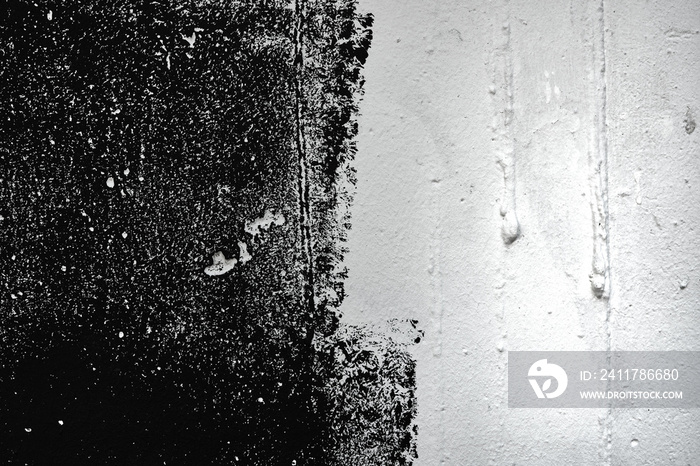 Abstract grunge texture pattern of black paint on white wall