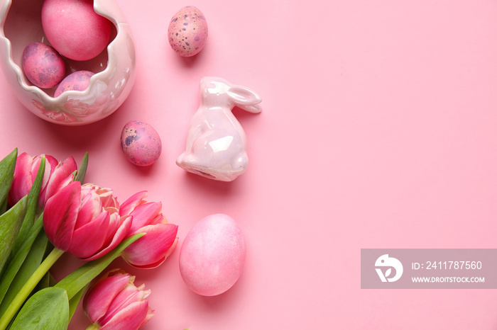 Easter bunny, tulip flowers and painted eggs on pink background