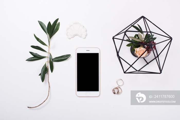 feminine tabletop flatlay with smartphone mock-up