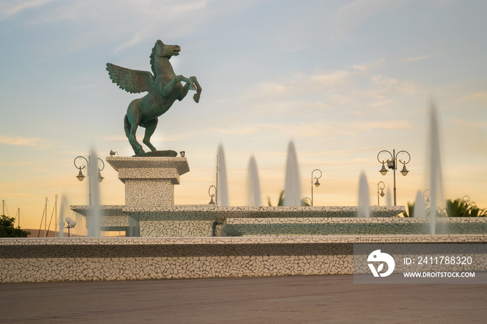 Pegasus statue in Corinth in Greece against the fountain. A beautiful scenic.