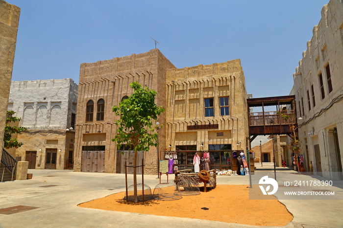 Old Dubai of buildings and traditional Arabian streets. Historical Al Fahidi neighborhood, Al Bastakiya in in Dubai.