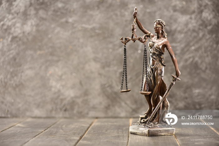Close-up view of antique statue of lady justice, Law concept
