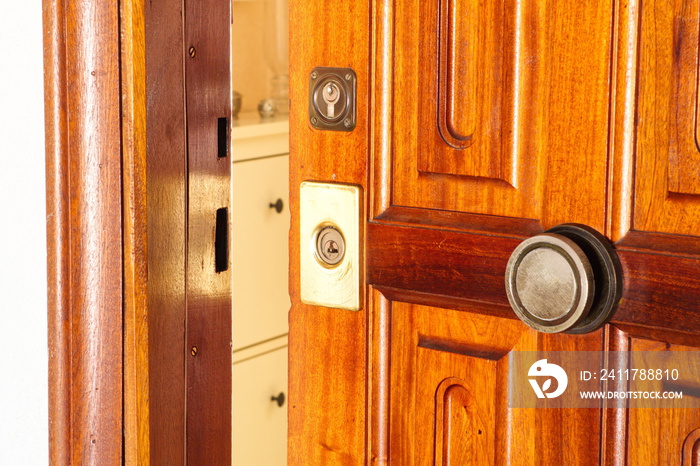 Old wooden door with metal lock