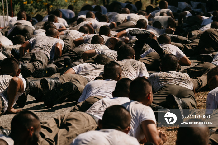 Soldiers game on military training ground ( battle camp ). Action. Operation Trainer giving training to military soldiers at boot camp Heavily Hot sun