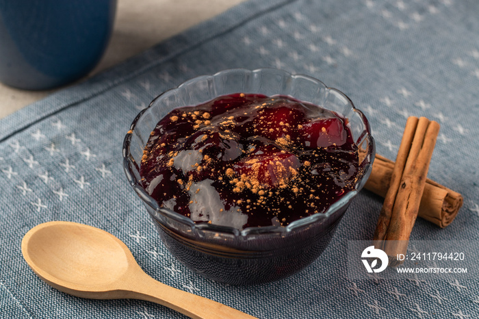 Peruvian purple jam dessert called mazamorra morada with dried fruits.