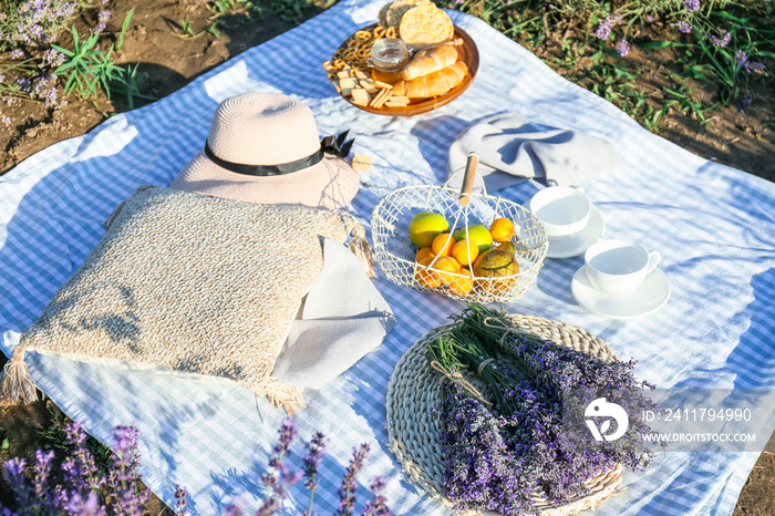 Tasty food for romantic picnic in lavender field