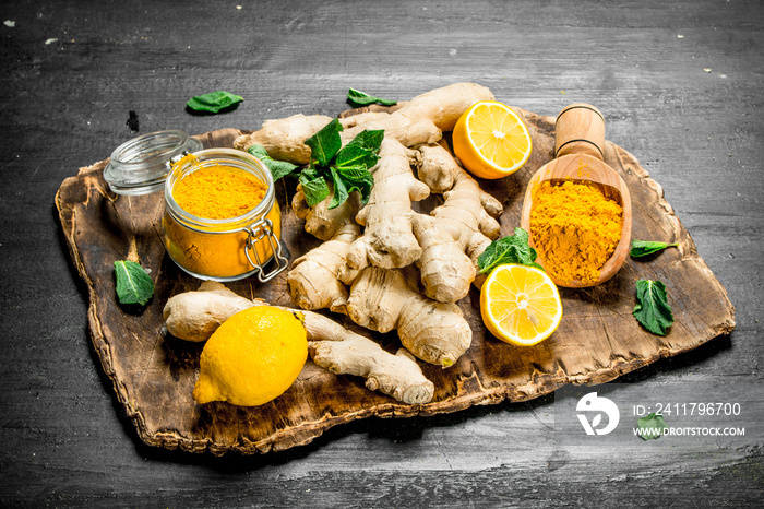 Fresh ginger with lemons and mint.