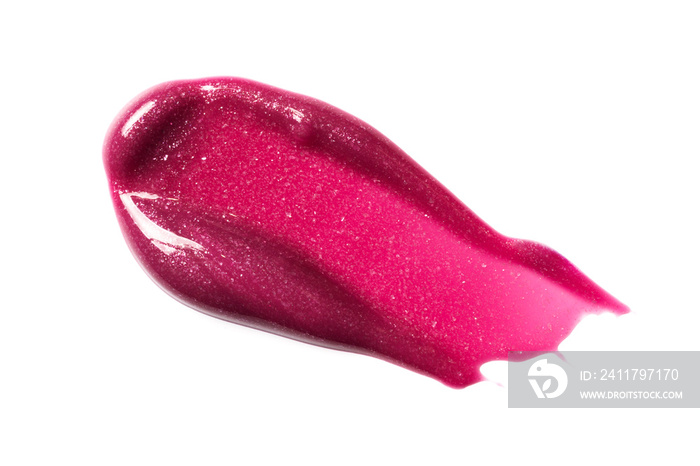 Close-up of make-up swatch. Smear of shiny pink lip gloss