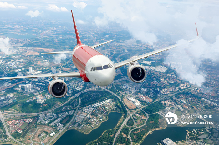 Plane flying sky. Airplane above city. Passenger aircraft climbs through the clouds. Planes and cities.