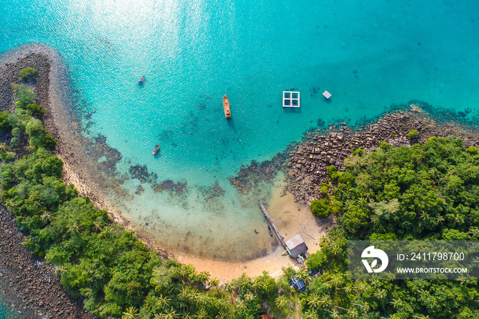 Amazing island with sand beach green tree forest aerial view