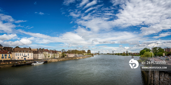 View along the River Saone from a bridge in Chalon sur Saone, Burgundy, France