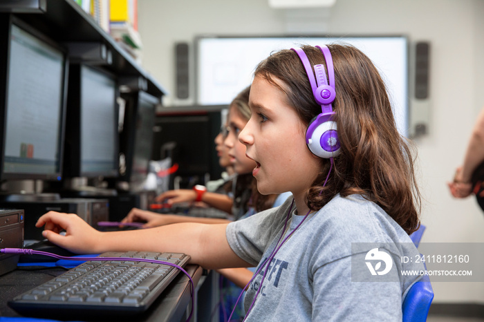 Children using computers in a classroom