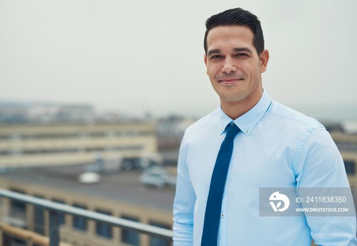 Smiling relaxed Hispanic businessman