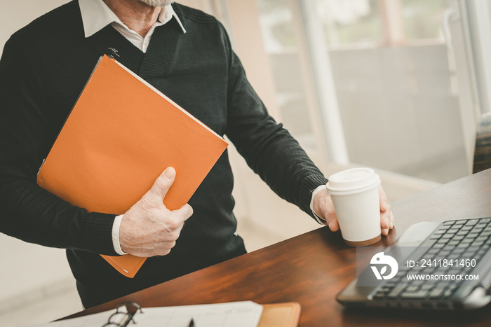 Businessman holding a folder