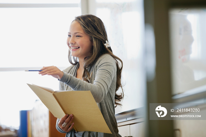 Female middle school student giving a presentation