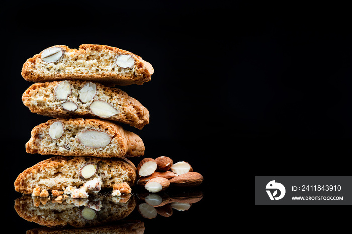 Italian Traditional Almond Biscuits Cantucci. Studio Shot on Black Background