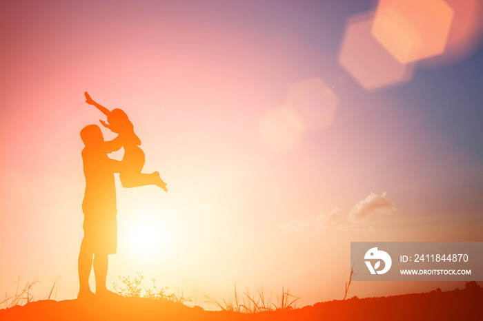 silhouette of father playing with his daughter