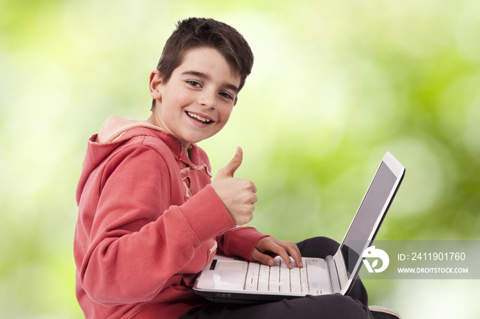 child with laptop computer