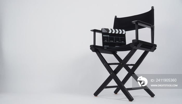 Clapper board or movie slate with director chair use in video production or movie and cinema industr
