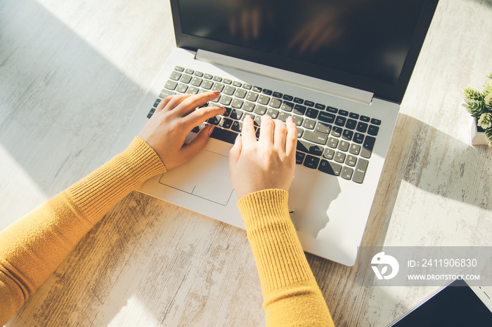 woman hand on computwe keyboard on desk