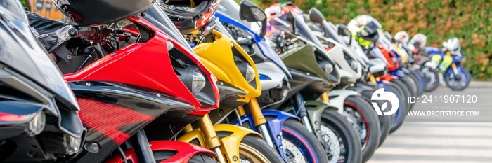 Motorcycles group parking on city street during adventure journey. Motorcyclists community travel co