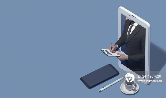 Businessman in a smartphone checking a financial report