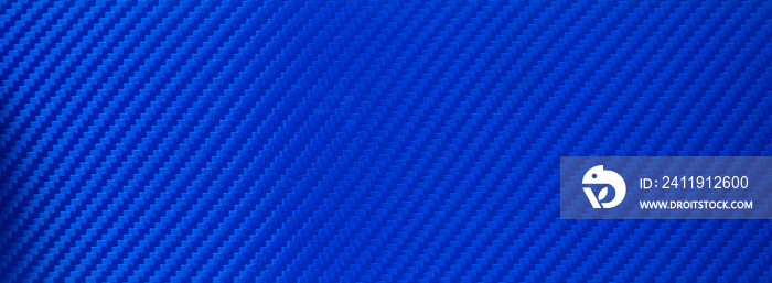 Blue rectangular carbon fiber texture. The sports background is blue. Vinyl film for pasting a car i