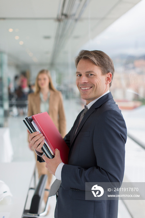 Portrait confident businessman in office