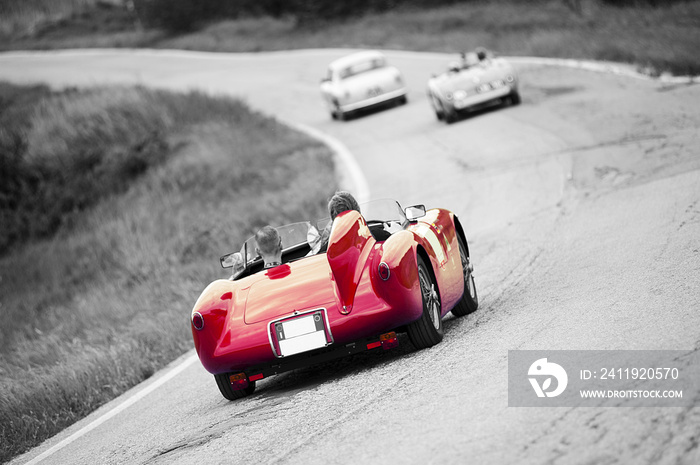 Vintage sport car on black and white background