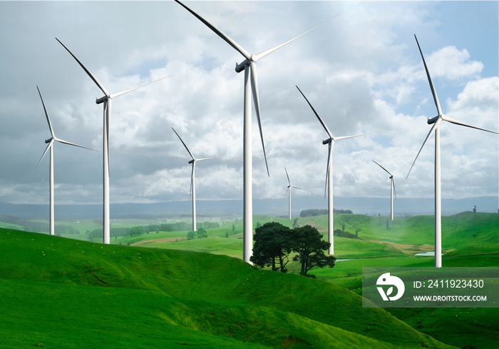 Wind turbine farm power generator in beautiful nature landscape for production of renewable green en