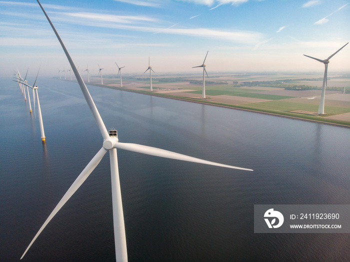 close view with drone at windmill park in the lake Ijsselmeer in the netherlands Noordoostpolder, Wi